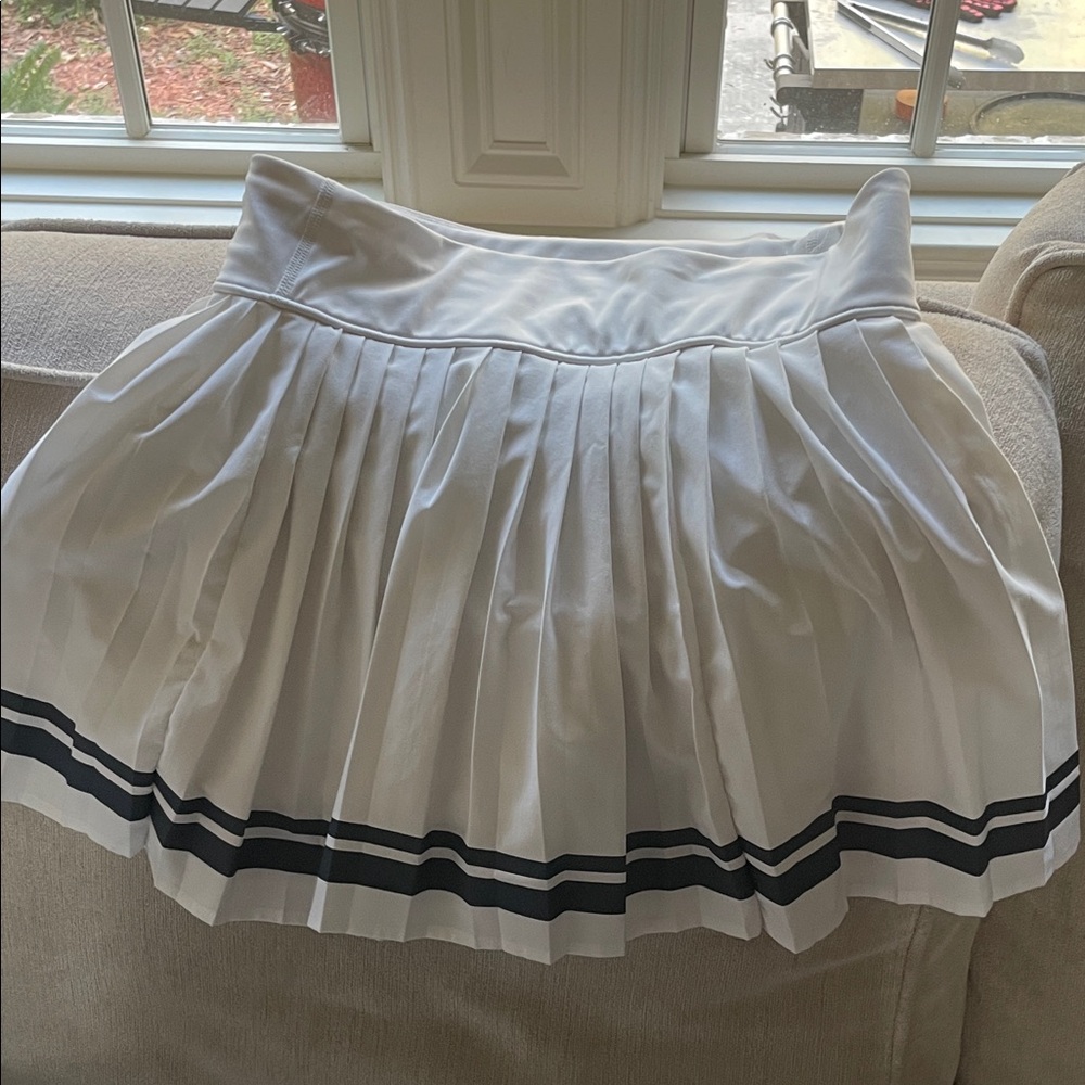 White Pleated Tennis Skirt with Navy Blue